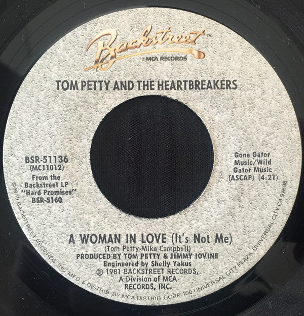 Tom Petty And The Heartbreakers : A Woman In Love (It's Not Me) (7", Single, Pin)